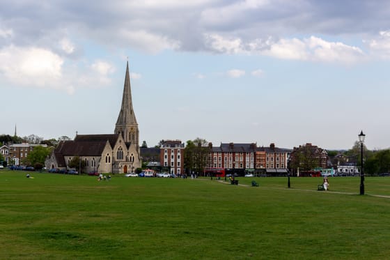 All Saints' Church standing on the heath, with Blackheath village behind